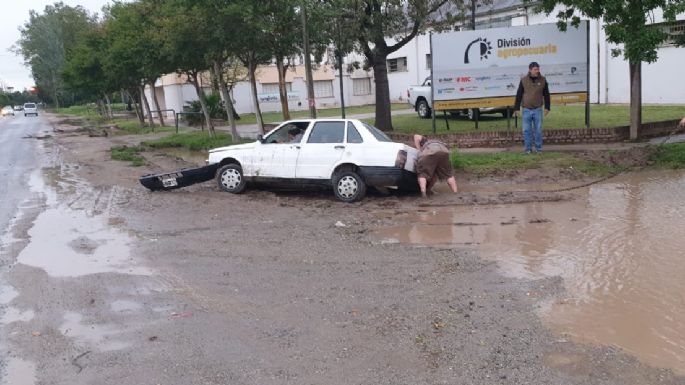 "Con la lluvia y los pozos, estas calles están intransitables"