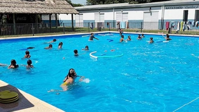 Con varios niños en Argentino