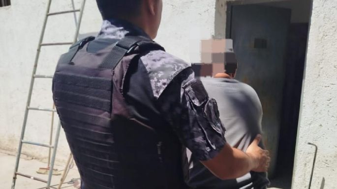 Detenido por amenazar a su vecino con un hacha
