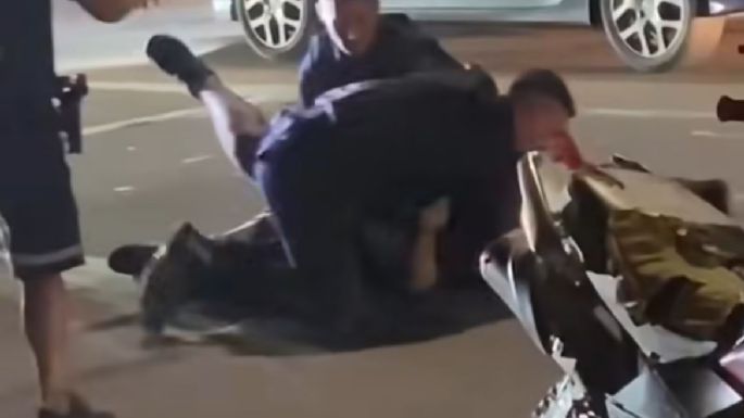 Registran violentas escenas en un control y detención de motociclista