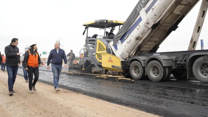 Empezaron a pavimentar la duplicación de calzada en el ingreso por ruta 158